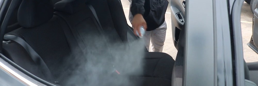 Novacide Car Application Applying Novacide to address cockroaches in a car