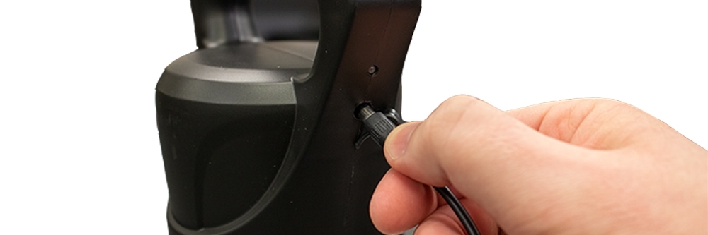 Inserting Charger into Electric Sprayer